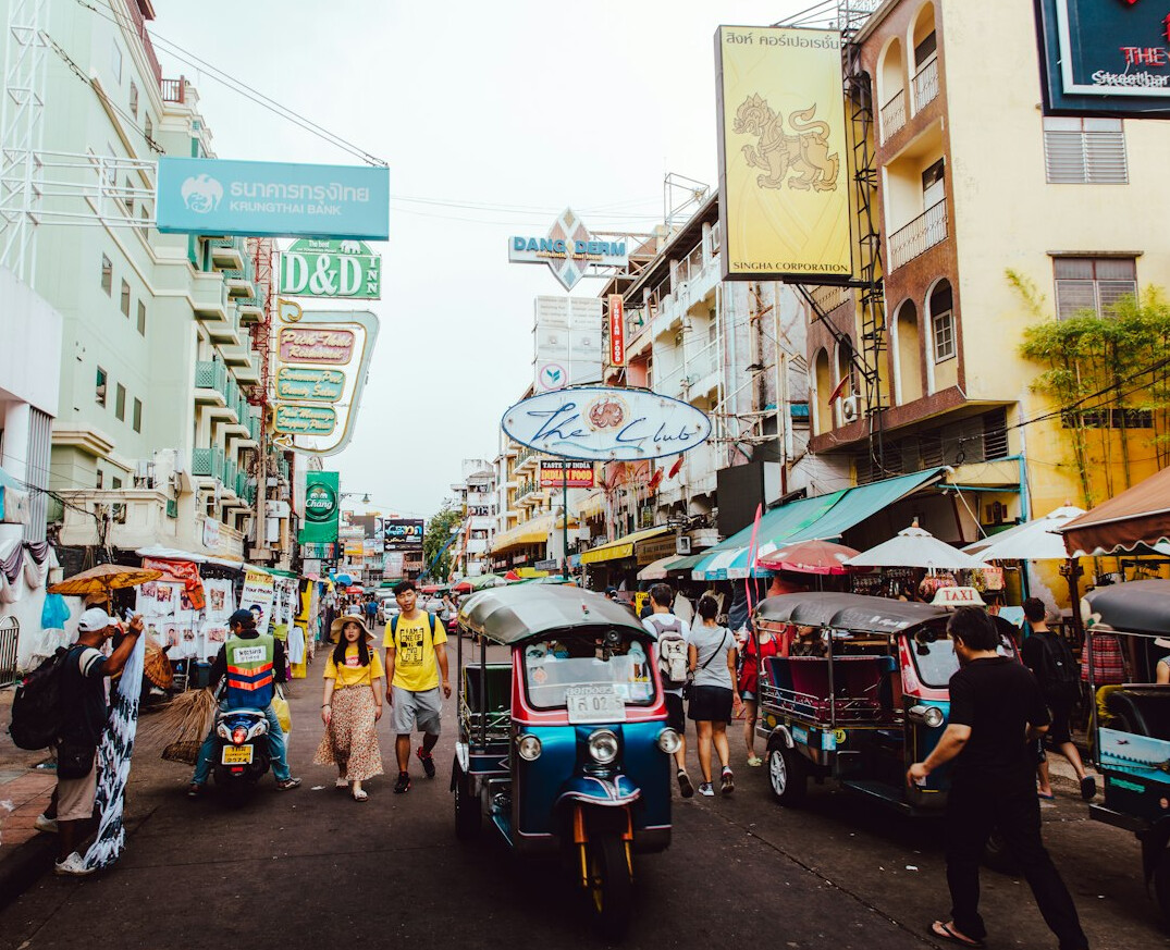 people walking on busy street